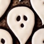 black cocoa cut out ghost sugar cookie with white royal icing