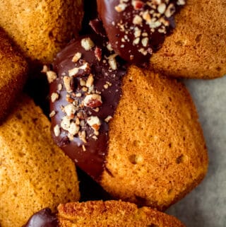 chocolate dipped madeleines with pecans