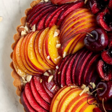 close up of tart with sliced fruit